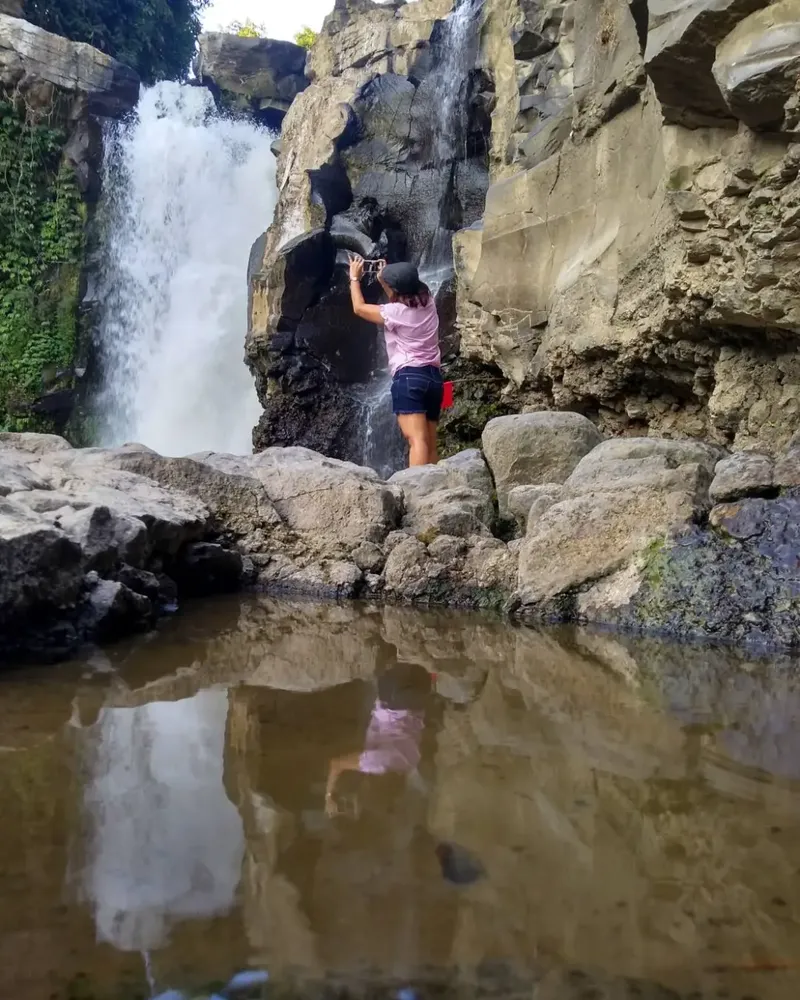 Taking Picture at Tegenungan Waterfall