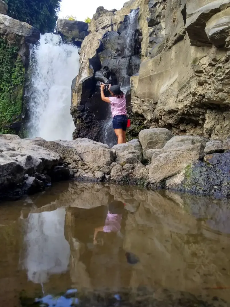 Taking Picture at Tegenungan Waterfall